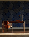 Petal Cascade Midnight spiral rosette wallpaper as a feature wall in a home study