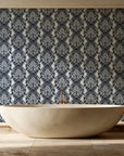 Poet's Blossom Charcoal classic damask wallpaper creating ambiance in a serene spa bathroom