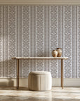 Porcelain Filigree Taupe filigree damask wallpaper on the wall of a grand entry foyer