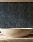 Quiet Camo Charcoal abstract wallpaper creating ambiance in a serene spa bathroom