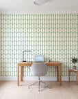 Quiet Grace Emerald minimalist arch wallpaper behind a modern oak desk in a bright home office