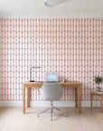 Quiet Grace Oxblood minimalist arch wallpaper behind a modern oak desk in a bright home office