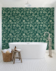 Quiet Reef Emerald sea life wallpaper behind a freestanding tub in a bright coastal bathroom