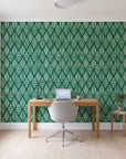 Reed & Smoke Emerald geometric wallpaper behind a modern oak desk in a bright home office