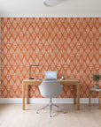 Reed & Smoke Terracotta geometric wallpaper behind a modern oak desk in a bright home office