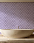 Rosewater Retreat Plum damask wallpaper creating ambiance in a serene spa bathroom