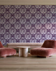 Secret Arbor Plum damask wallpaper in a boutique hotel sitting area