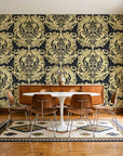 Serene Blossom Noir damask wallpaper in a mid-century dining room with a teak sideboard and tulip table