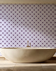Shadow Garden Plum lattice floral wallpaper creating ambiance in a serene spa bathroom
