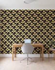 Signal & Edge Noir geometric wallpaper behind a modern oak desk in a bright home office