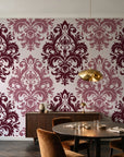 Silent Bouquet Oxblood damask wallpaper in an elegant dining room