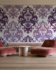 Silent Bouquet Plum damask wallpaper in a boutique hotel sitting area