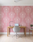 Silent Spring Rose damask wallpaper behind a modern oak desk in a bright home office