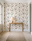 Sketch Anemone Fern sketched anemone wallpaper behind a console table in a light entry hallway