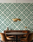 Soft Bouquet Opus Emerald floral damask wallpaper behind a walnut credenza and round table in an elegant dining room