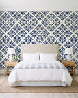 Soft Bouquet Opus Midnight floral damask wallpaper behind a queen bed in a bright coastal bedroom