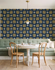 Solstice Bloom Midnight folk sun wallpaper as a feature wall in a sunlit breakfast nook
