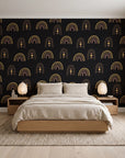 Solstice Rite Eclipse boho rainbow wallpaper behind a low platform bed in a serene Japandi bedroom