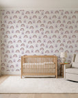 Solstice Rite Plum boho rainbow wallpaper in a calm, light-filled nursery