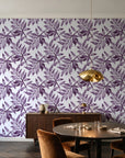 Starfall Plum watercolor leaf wallpaper in an elegant dining room