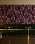 Starlit Swirl Oxblood dotted art deco fan wallpaper in an intimate luxury cocktail lounge