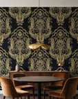 Sunlit Thicket Noir damask wallpaper behind a walnut credenza and round table in an elegant dining room