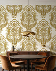 Sunlit Thicket Ochre damask wallpaper behind a walnut credenza and round table in an elegant dining room