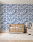 Tranquil Flora Indigo floral damask wallpaper in a calm, light-filled nursery