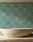 Velvet Vine Serenade Emerald damask wallpaper creating ambiance in a serene spa bathroom