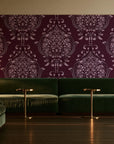 Vintage Eden Oxblood damask wallpaper in an intimate luxury cocktail lounge