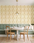 Willow Trace Ochre willow vine wallpaper as a feature wall in a sunlit breakfast nook