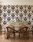 Woodland Blossom Veil Espresso damask wallpaper in a farmhouse dining room with a sage sideboard and rustic trestle table