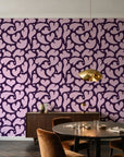 Woven Whisper Aubergine abstract heart wallpaper in an elegant dining room