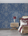 Navy blue and cream Afternoon Arbor damask wallpaper with ornate floral scrollwork in elegant bedroom setting