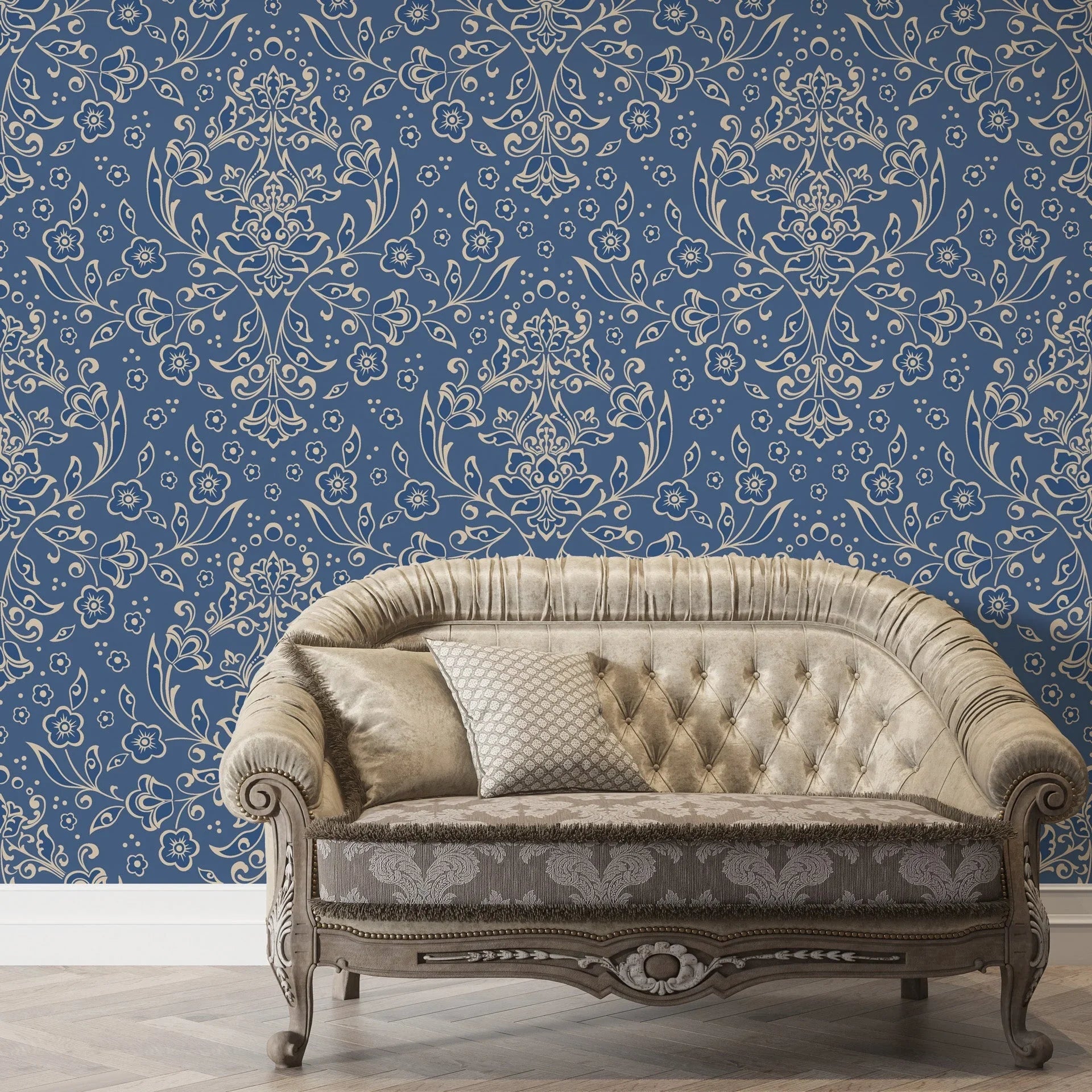 Navy blue and gold Afternoon Arbor damask wallpaper with ornate floral scrollwork behind tufted settee