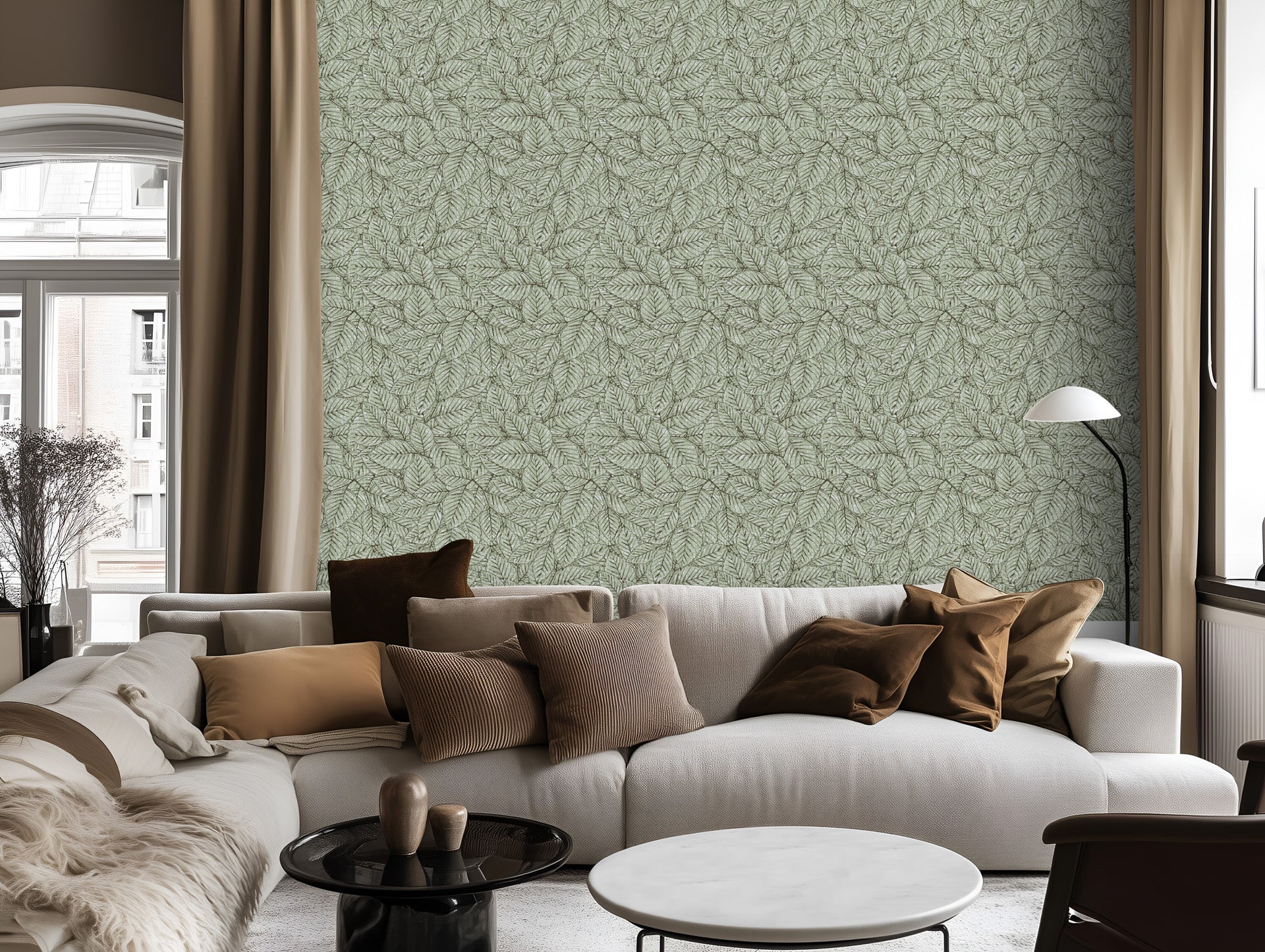 Living room with a white sofa, patterned wallpaper, and decorative pillows.