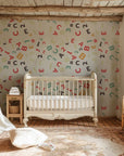 Self-adhesive matte wall covering featuring multicolored letters and numerals in bold shades - Alphabet Soup