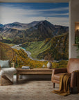 Scenic alpine panorama with layered peaks and golden forests on removable wallpaper
