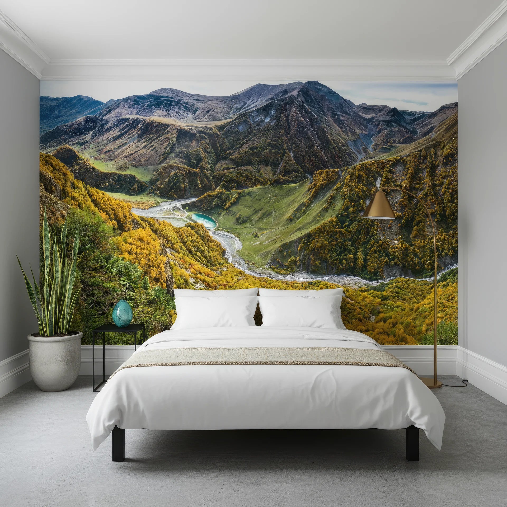 Mountain landscape wallpaper featuring turquoise river winding through autumn valleys