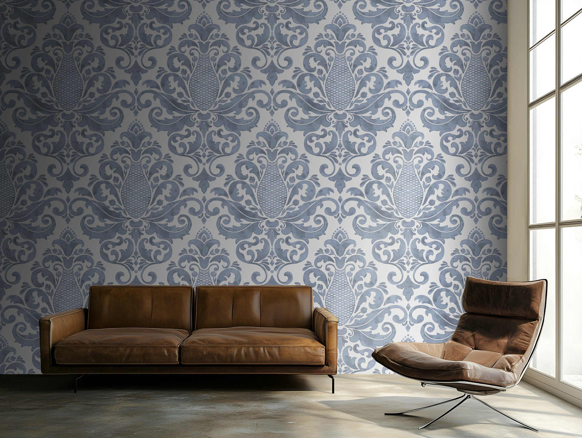 Modern living room with brown leather sofa and chair against a decorative wallpaper.