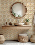 Botanical wallpaper in white featuring vines, with leaves colored both amber and green, product 'Amber Breeze'