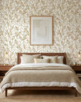 Amber Leaf gold botanical wallpaper in a warm and inviting living room