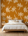 Amber Palms retro palm wallpaper adding character to a cozy bedroom