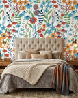 Amber Poppy vibrant floral peel and stick wallpaper in a warm and inviting living room