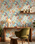 Amber Poppy vibrant floral peel and stick wallpaper adding character to a cozy bedroom