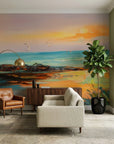 Amber Shore coastal sunset painterly wallpaper in a warm and inviting living room