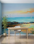 Amber Shore coastal sunset painterly wallpaper as a feature wall in a bright home office