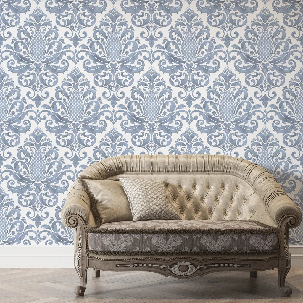 Amber Blossom Ballet removable wallpaper with slate blue damask pattern behind vintage tufted sofa