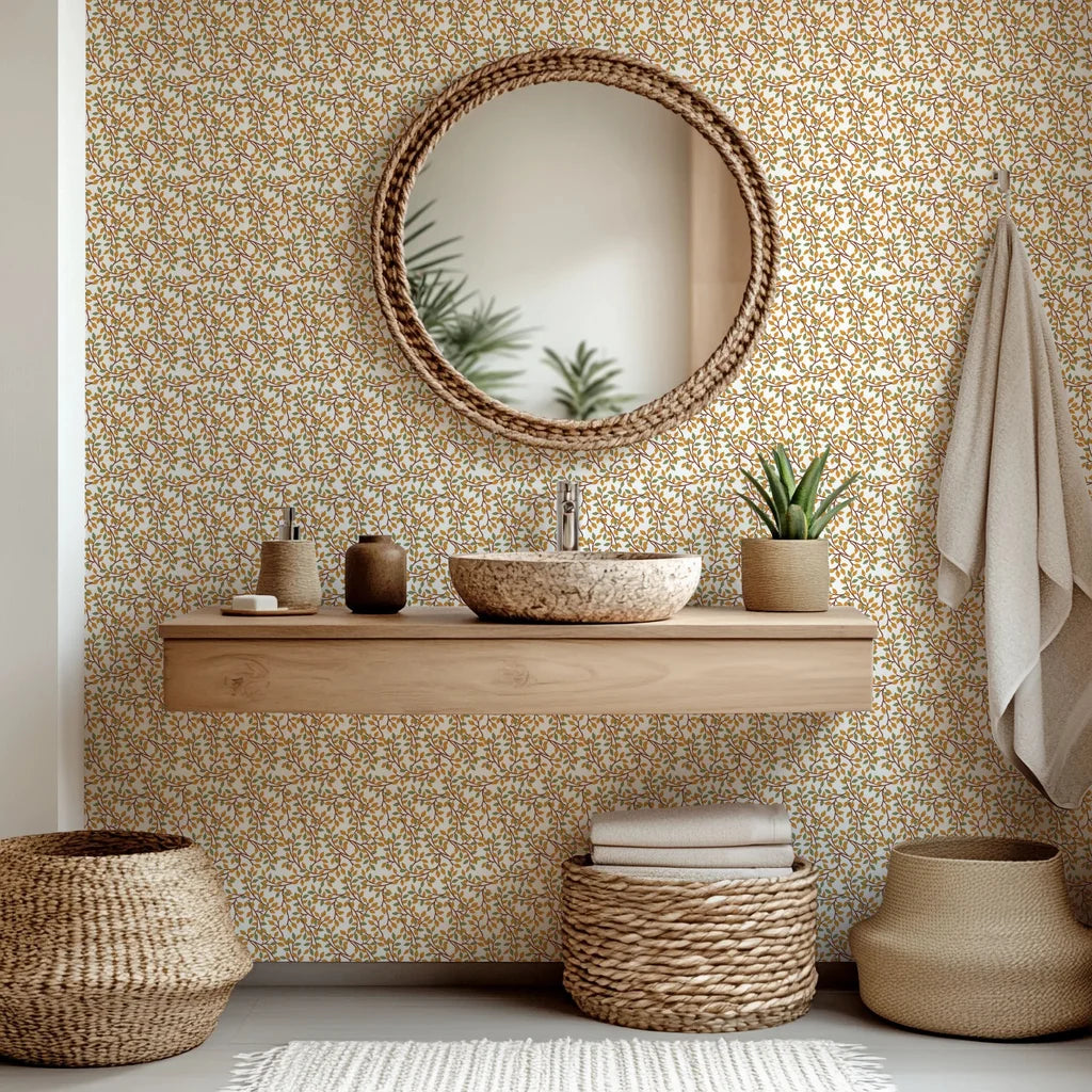 Botanical wallpaper in white featuring vines, with leaves colored both amber and green, product 'Amber Breeze'