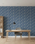 Amber Hour blue botanical leaf wallpaper as a feature wall in a bright home office